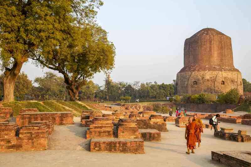 Sarnath, Uttar Pradesh, Buddhist pilgrimage site, Buddhist monuments, ancient Indian history, Dhamekh Stupa, Ashoka Chakra, Buddha's first sermon, Sarnath Museum.
