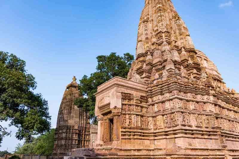 Khajuraho Temples, Madhya Pradesh, India, history, architecture, significance, culture, heritage, tourism, Hindu, Jain, deities, sculptures, carvings, medieval period.